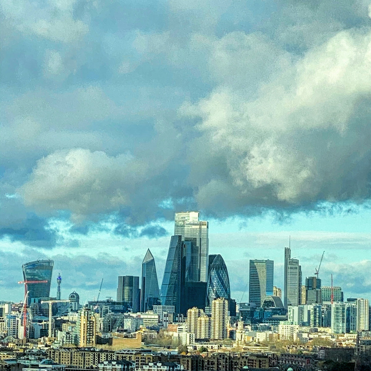 a city skyline with clouds